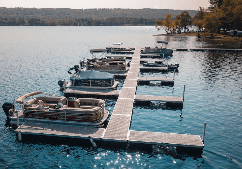 A-small-floating-marina-features-seven-different-docked-boats.